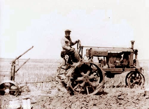 Martin Enger on Farmall Tractor, 1911, Belt, Cascade County, Montana