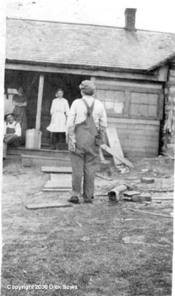 Adella (Brooks) Phillips " Moma taking down the storm porch" Castner Falls, Cascade County, Montana