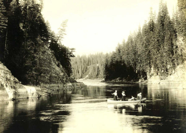 Unknown Group Floating a River in a Boat, Possibly Flathead or Lincoln County, Montana
