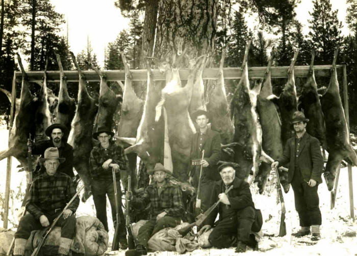 Unknown Men and the Deer from their Hunt, Possibly Flathead or Lincoln County, Montana